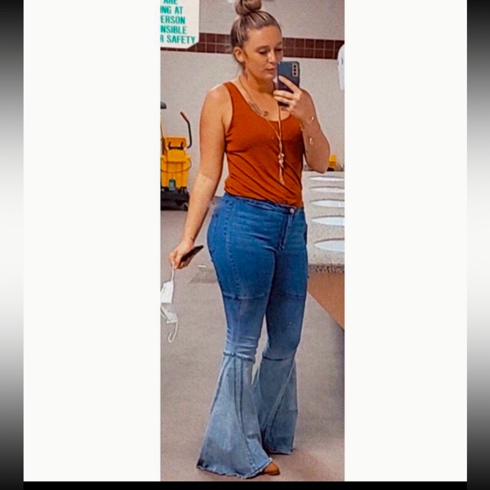 Ombré colored bell bottom jeans